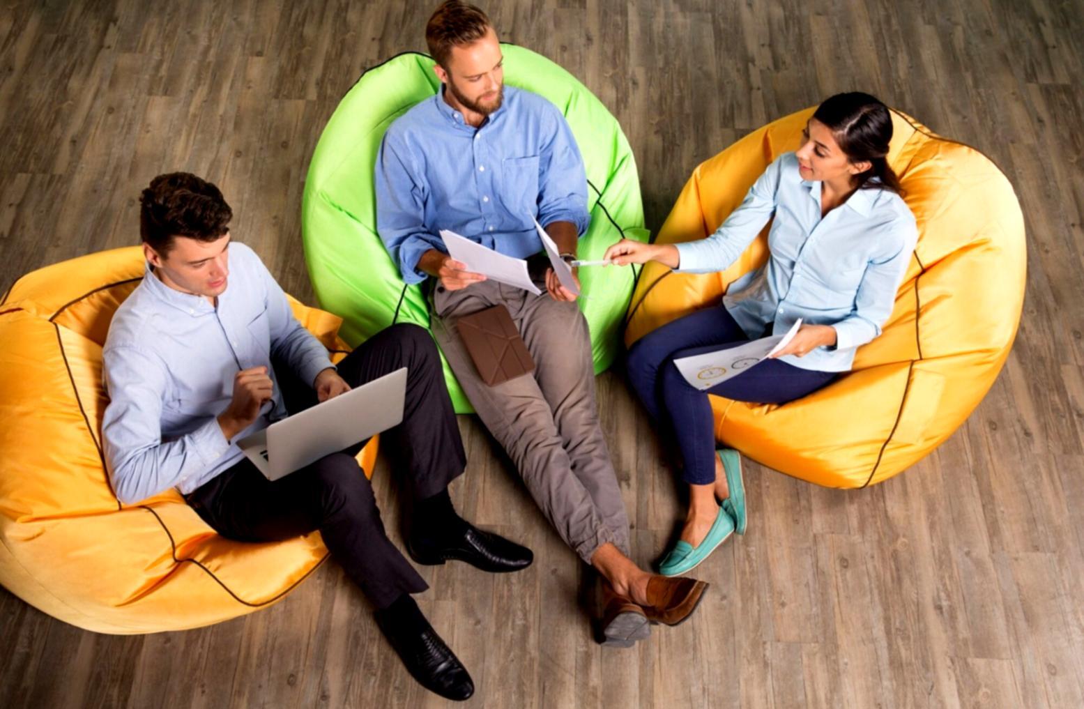 Business professional managing multiple project documents